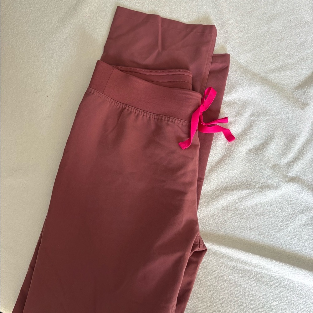 Figs regular waisted livingston in mauve pink color